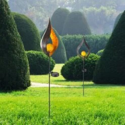 LED Solarlampe Glaskugel In Blumenförmigen Metallbogen Bronzefarben Von Globo -Leuchten Verkauf 33467 am a