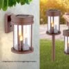 LED Solarlaterne Mit 3 Kerzen Zum Hängen, Stellen Oder Erdspitz LED Flackert Kunststoff Acryl Rostfarben Klar Von Globo -Leuchten Verkauf globo36702 am