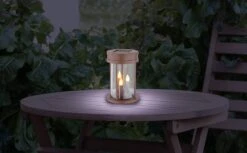 LED Solarlaterne Mit 3 Kerzen Zum Hängen, Stellen Oder Erdspitz LED Flackert Kunststoff Acryl Rostfarben Klar Von Globo -Leuchten Verkauf globo36702 am2